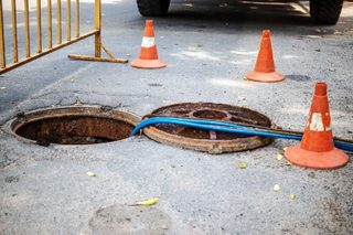 Détartrage et déraçinage de canalisation par hydrocurage